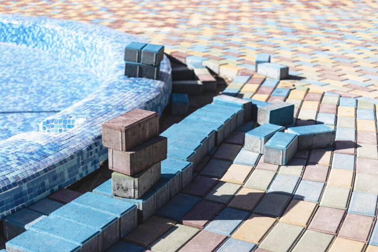 The Benefits of Using Pavers Around Your Pool: Enhancing Safety and Aesthetics